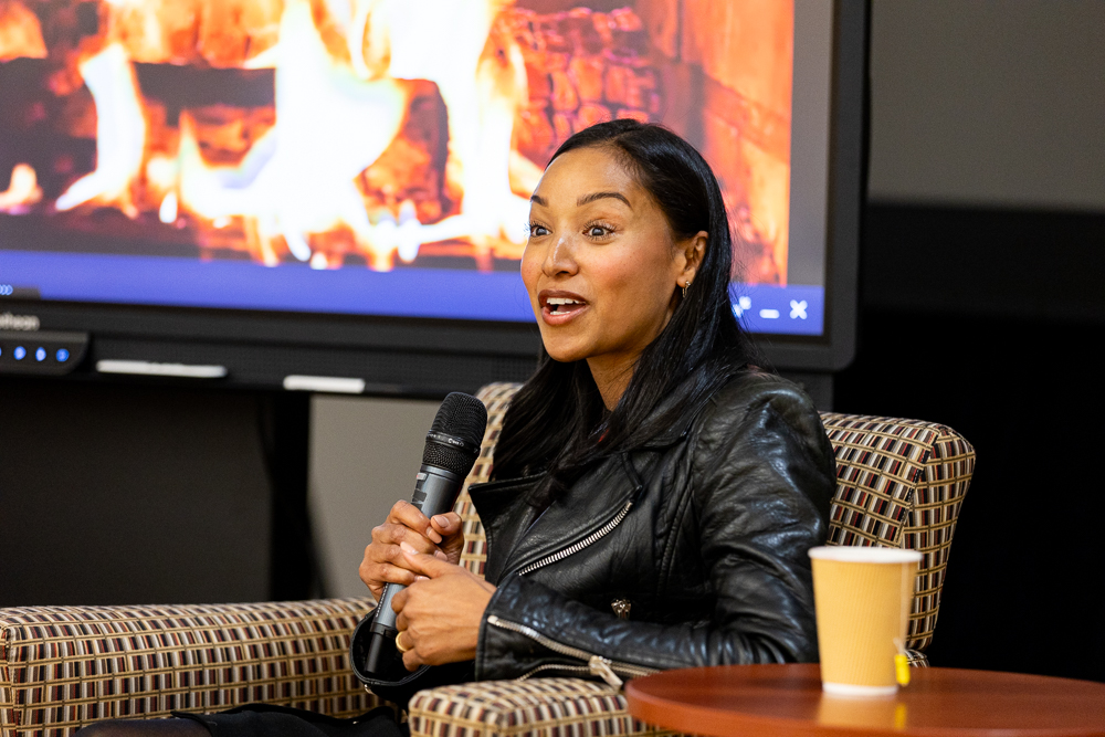 woman speaking into microphone