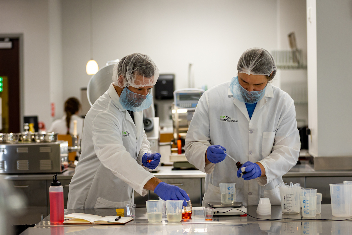 NCFIL members working in the lab for Spirits of Alchemy.